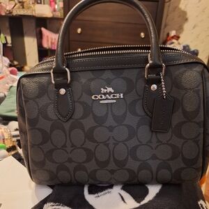 Gorgeous coach handbag with horse and carriage